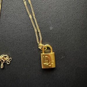 DIOR Lock 🔒 charm/pendant 15 MM BRIGHT GOLD DOUBLE SIDED